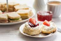 Tea sandwiches with strawberries on top
